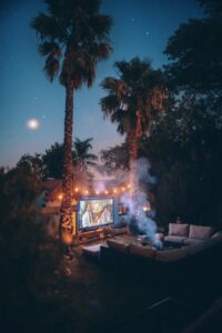 Looking to host an unforgettable outdoor movie night during the fall season Discover how to create a cozy ambiance with seating options, set up a movie screen and projector